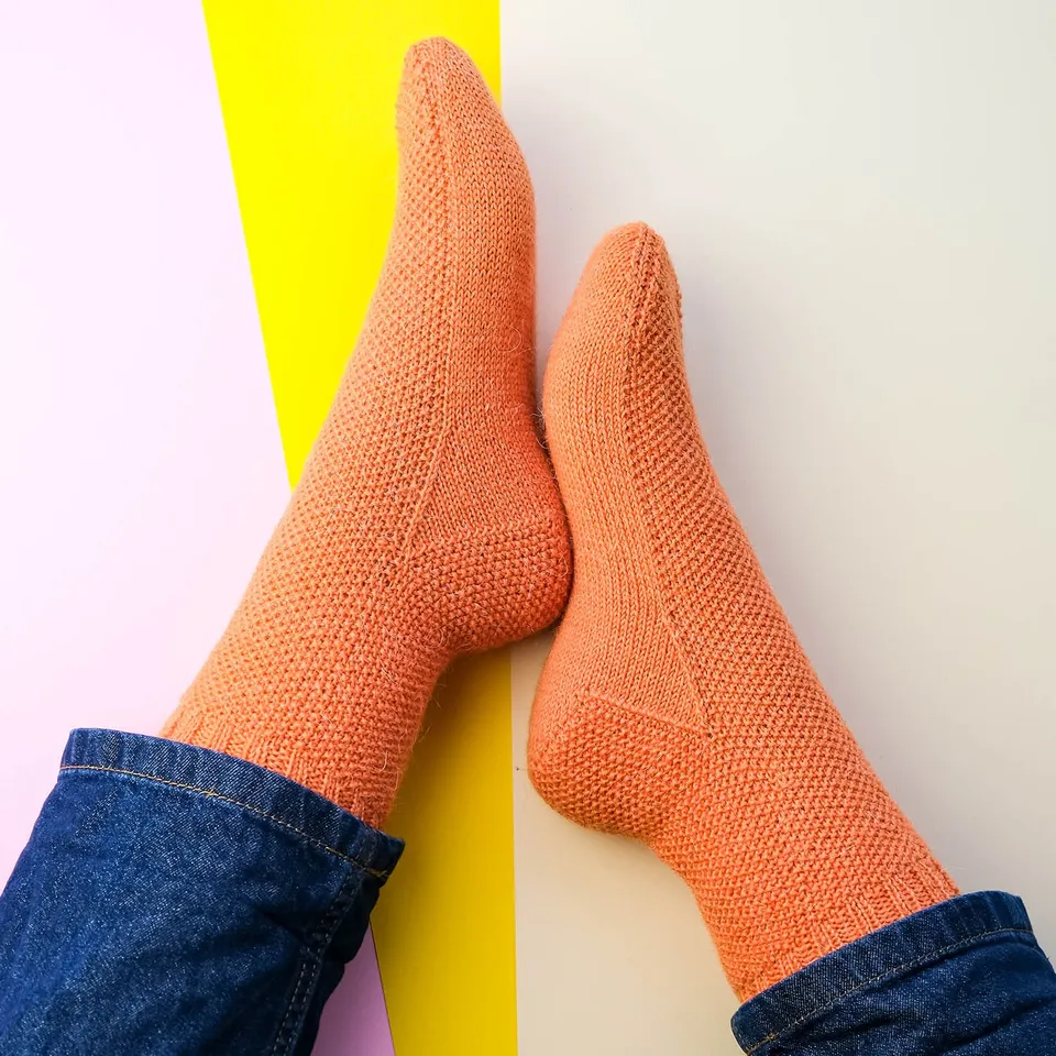 kremke-soul-wool-fruity-socks-orange-strickanleitung-de-pdf-socken image 1