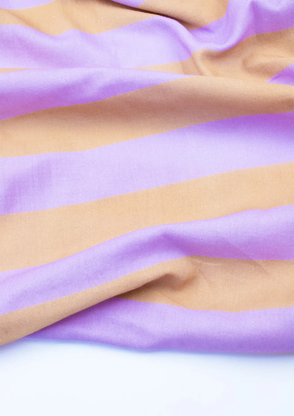 konfetti-patterns-musselin-stoff-konfettistreifen-lilac-caramel-meter image 1